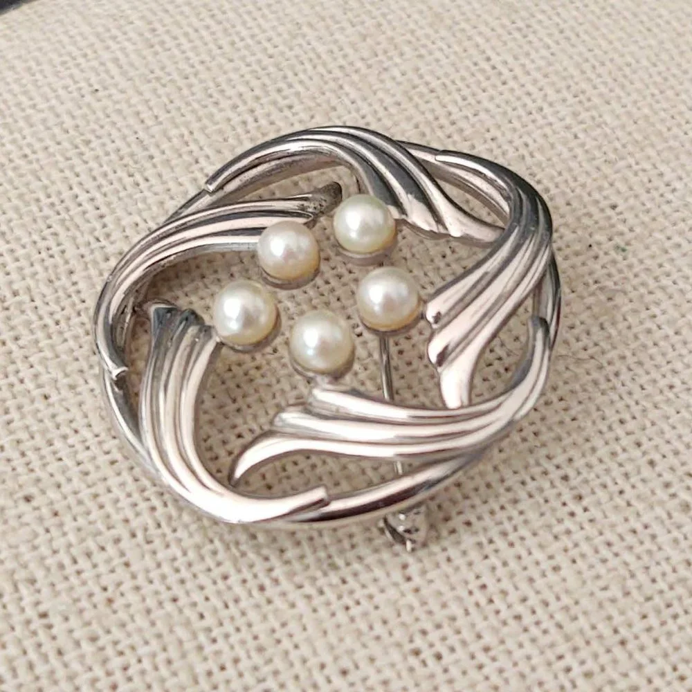 Vintage Simmons sterling and pearl brooch